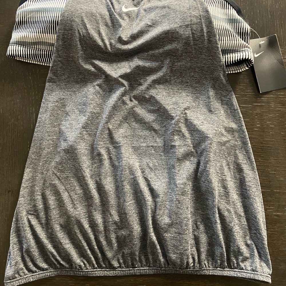 Brand new never worn Nike athletic tank top with built in bralette. New with tag